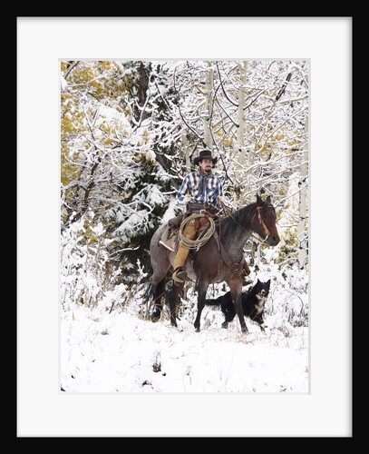 Cowboys riding in Autumn Aspens with a fresh snowfall by Anonymous