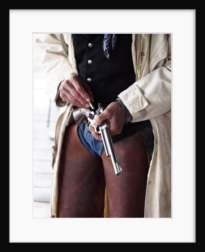 Cowboy Loading Gun by Anonymous