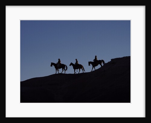 Cowboys in silhouette by Anonymous