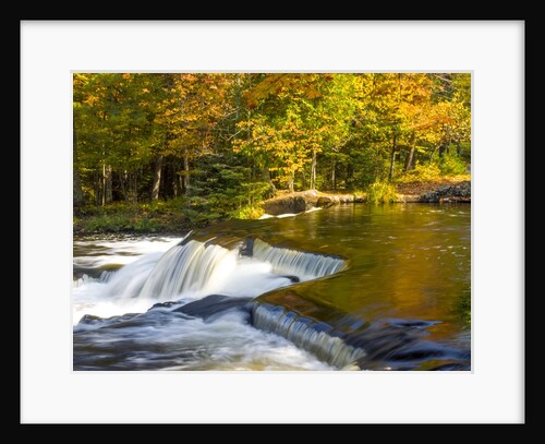 Trees reflect in cascade above Bond Falls on the Middle Fork of the Ontonagon river near Paulding in by Anonymous