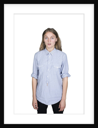 Portrait of teenage girl (16-17) on white background by Anonymous