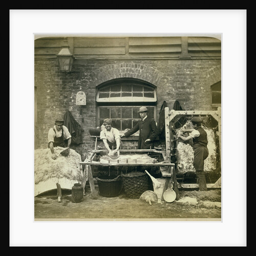 Photograph of Leather Workers Preparing Skins at Bevingtons and Sons by Anonymous