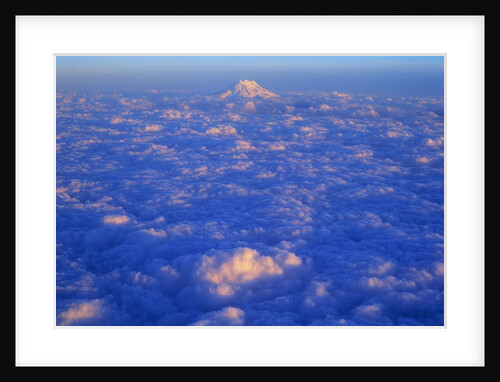 The Snowy Peak of Mount Rainier Rises Above the Clouds by Anonymous