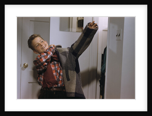 Boy Putting on His Jacket by Anonymous