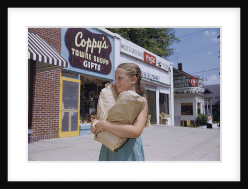 Girl Carrying Paper Shopping Bags by Anonymous