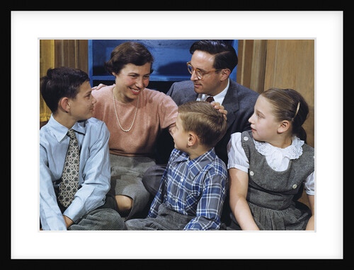 Happy Family Gathered Together at Home by Anonymous