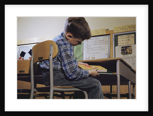 Schoolchild Placing Books in Desk by Anonymous