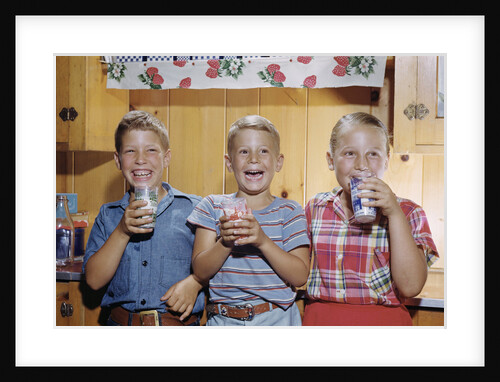 Happy Children Enjoying Glass of Cold Milk by Anonymous