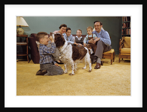 Boy Playing with the Family Dog by Anonymous