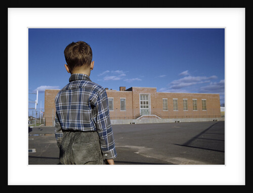 Boy Standing in Schoolyard by Anonymous