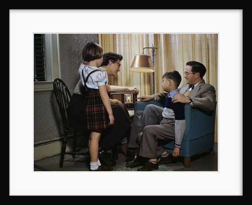 Family Listening to a Radio by Anonymous