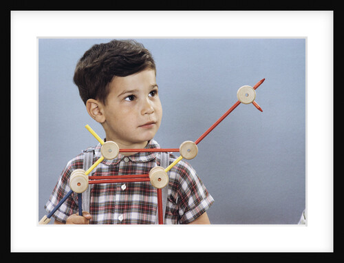 Boy Playing with Tinkertoys (TM) by Anonymous