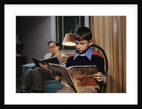 Father and Son Reading at Home by Anonymous