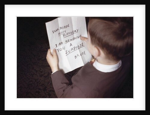 Boy Reading Birthday Message by Anonymous
