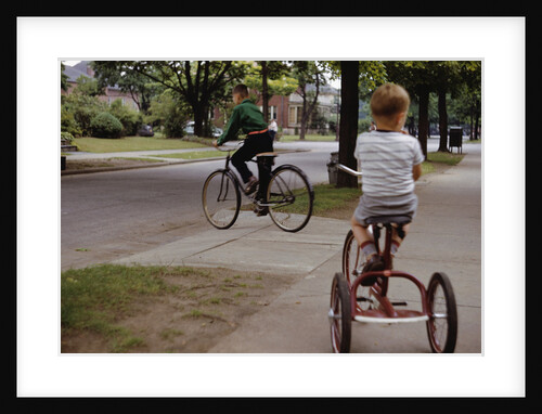 Boys Riding Their Bike and Tricycle by Anonymous