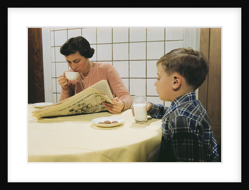 Boy Eating Cookies and Milk as Mom Reads by Anonymous