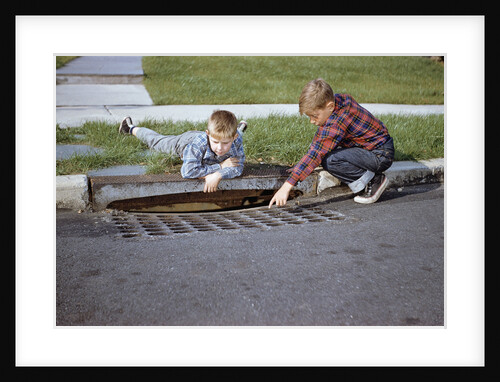 Boys Looking into Grate by Anonymous