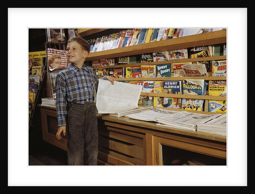 Boy Holding Paper in Newsstand by Anonymous