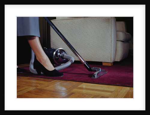 Woman Vacuuming Rug by Anonymous