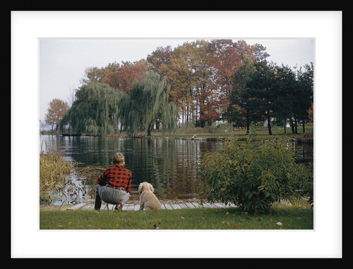 Boy and Dog Looking at Lake by Anonymous