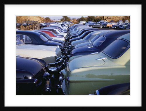 Cars Parked Bumper to Bumper by Anonymous