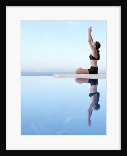 Woman Exercising on Swimming Pool Edge by Anonymous