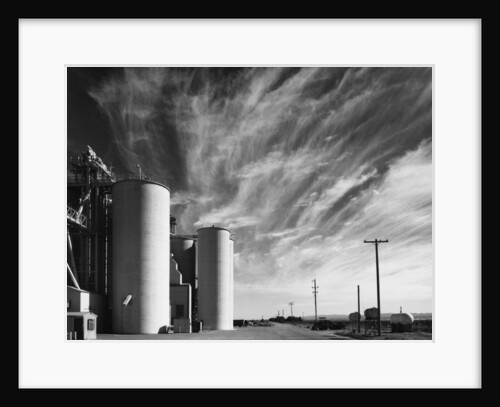 Grain Elevators with Clouds by Gordon Osmundson
