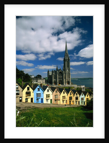 St. Coleman's Cathedral of Cobh Behind Colorful Row Houses by Anonymous