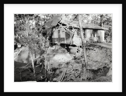 60-Foot Deep Sinkhole Swallows Home by Anonymous