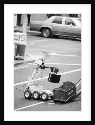 Police Robot Disposing of Suspicious Briefcase by Anonymous