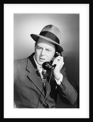 Man Using Telephone by Anonymous