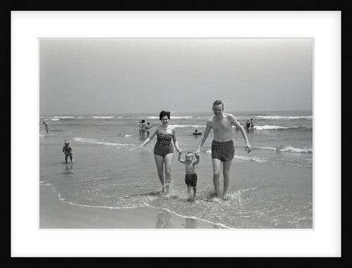 Family Walking on the Beach by Anonymous
