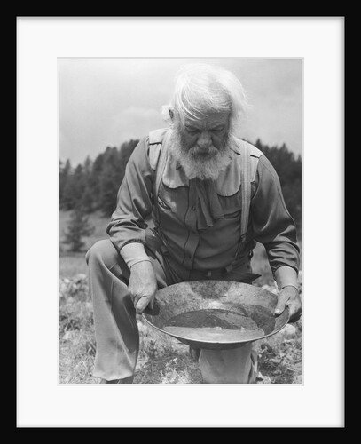Old-Time Gold Prospector with Pan in Hands by Anonymous
