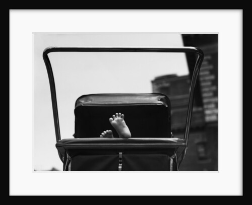 Baby's Feet Peeking out of Carriage by Anonymous