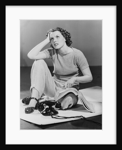 Phone Book Perplexing Woman by Anonymous