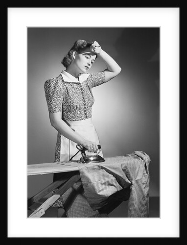 Woman Hard at Work Ironing by Anonymous