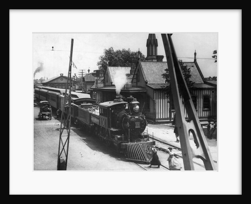American Railroad Station With Train by Anonymous