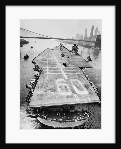 Huge Supercarrier Sailing Under Bridge by Anonymous