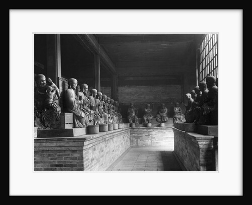 Chinese Gods Lined In A Temple by Anonymous