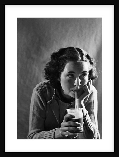 Girl Sipping a Soda by Anonymous