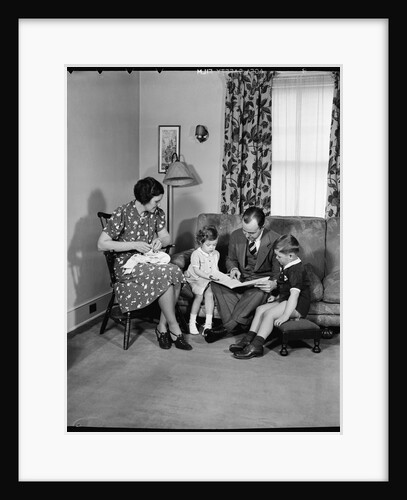 Family in Their Living Room by Anonymous