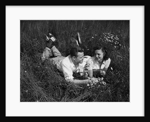 Young Couple Lying in the Grass by Anonymous