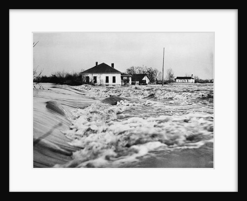 Flood Water Rushing by Houses in Mississippi by Anonymous