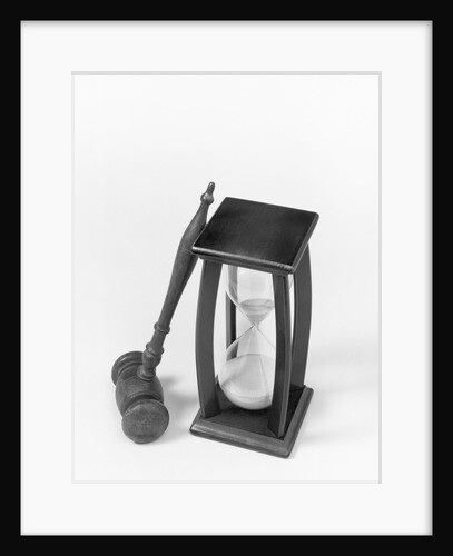 Gavel Propped Against An Hourglass by Anonymous