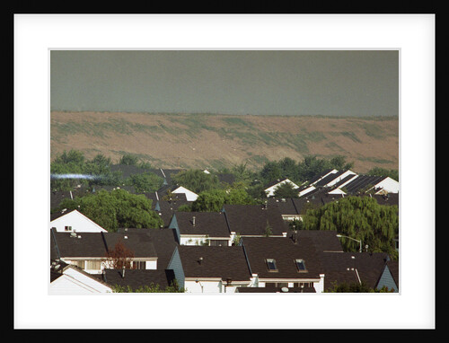 View Of Landfill Over Housing Developmen by Anonymous