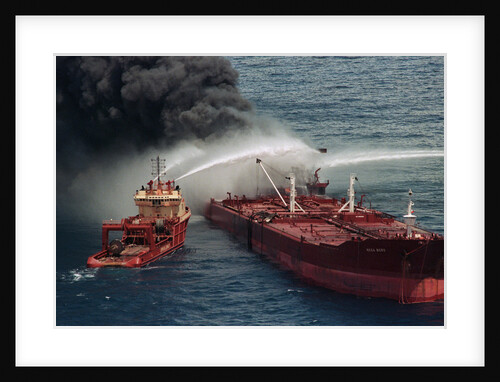 Boat Pours Water On Burning Oil Tanker by Anonymous