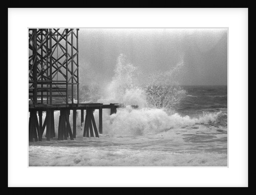 High Waves Crash On Boardwalk Pier by Anonymous