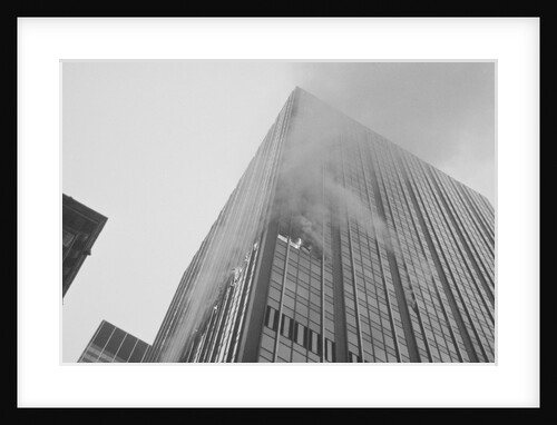 Smoke & Flame From Burning Skyscraper by Anonymous
