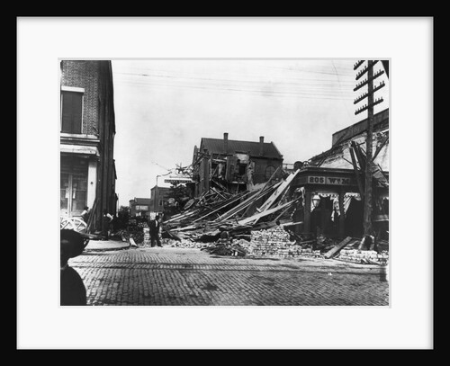 Earthquake-Damaged Homes by Anonymous
