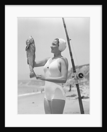 Female Fisherman Showing Her Catch by Anonymous